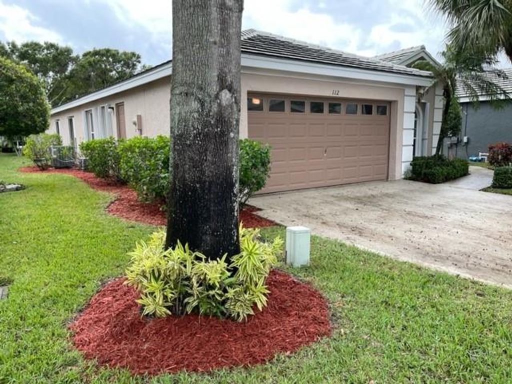 Photo of 112 Harbor Lake Circle, Greenacres, FL 33413 (MLS # F10404826)
