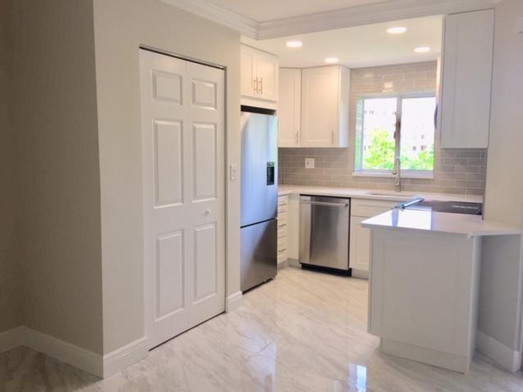 Photo of 275 Palm D205 Avenue #D-205, Jupiter, FL 33477 (MLS # R10840041)