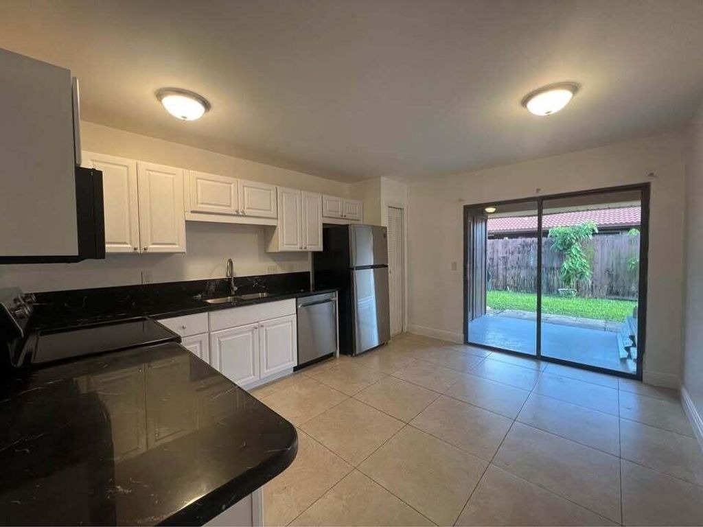 Photo of 5971 Forest Hill Boulevard #2, West Palm Beach, FL 33415 (MLS # R11125666)