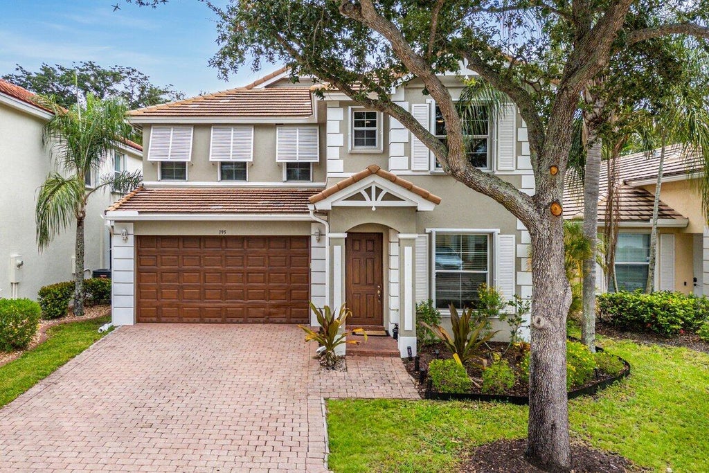 Photo of 195 Belle Grove Lane, Royal Palm Beach, FL 33411 (MLS # R11096041)
