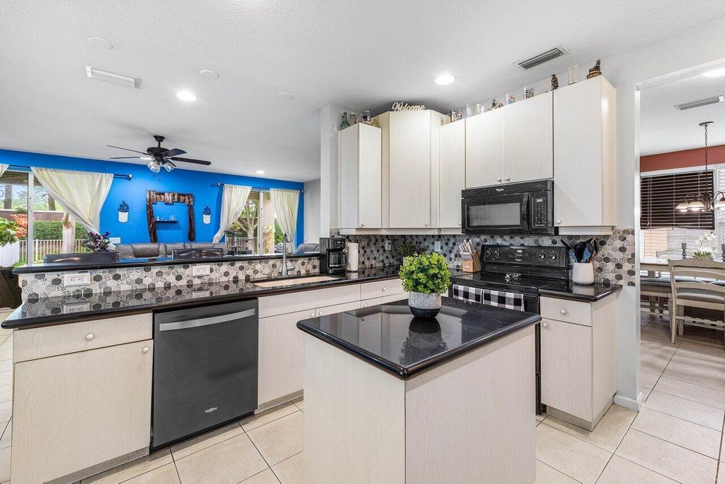 Photo of 195 Belle Grove Lane, Royal Palm Beach, FL 33411 (MLS # R11096041)