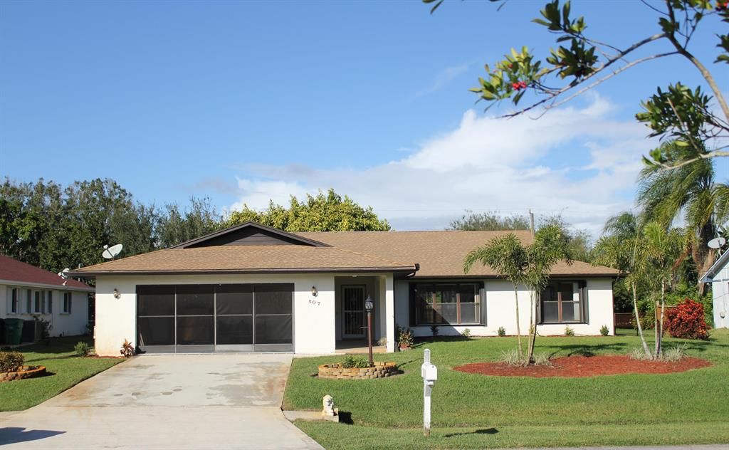 Photo of 507 NW Azalea Avenue, Port Saint Lucie, FL 34983 (MLS # R10764975)