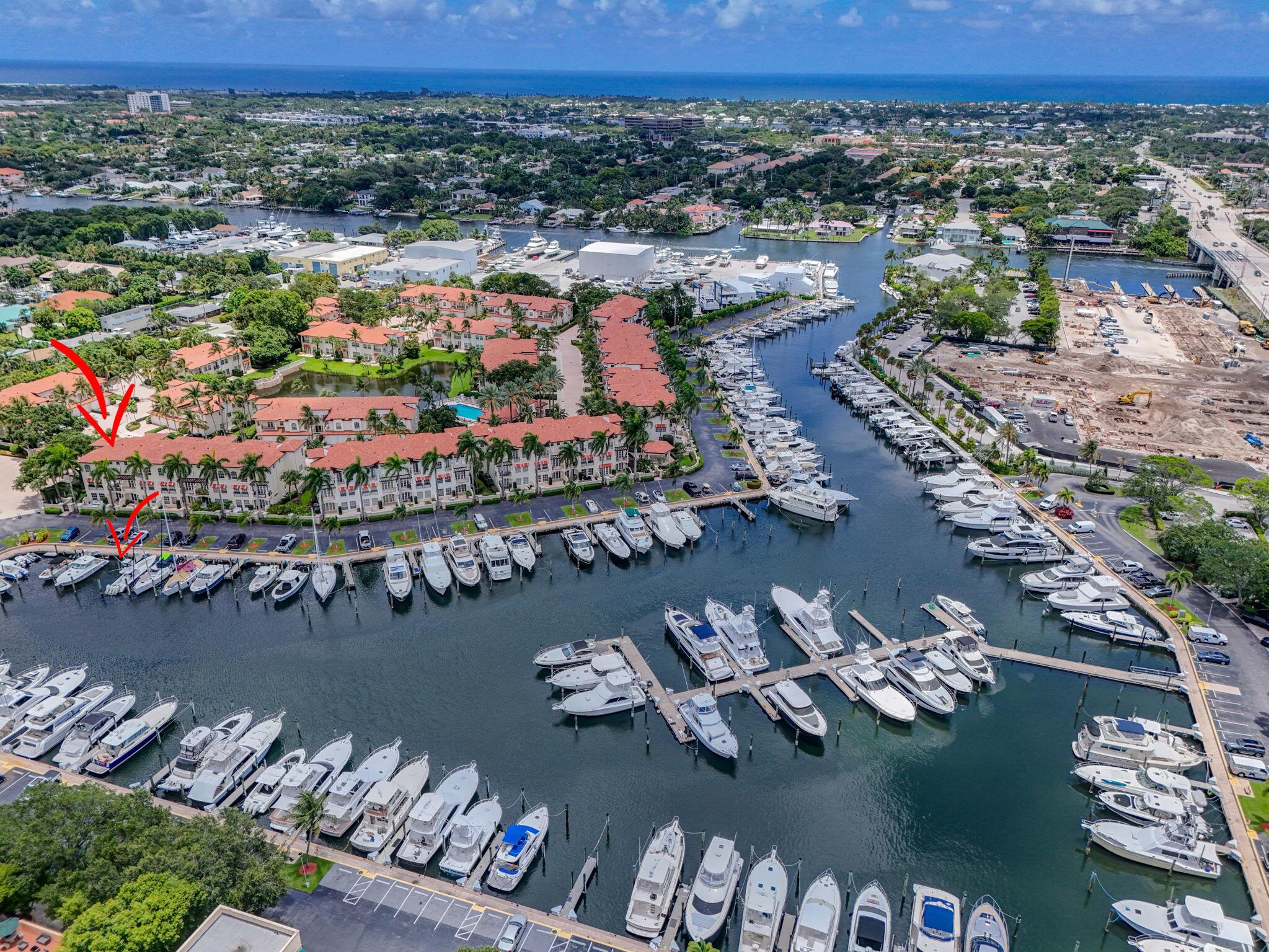 Indulge In Luxury Waterfront Living in this Beautifully Updated 3-Story Corner Townhouse, Complete w/a 45' Boat Slip Directly Behind Unit, Located in the Exclusive Gated Community of Marina Gardens on Soverel Harbour Marina. This Elegant 3BR/4BA Residence Offers 2-Car Garage, Private Elevator, & Spacious 1st Floor Bonus Room Featuring A Sleek Wet Bar, Beverage Refrigerator, Full Bath & Spacious Waterfront Patio w/Gas Grill Hookup Perfect For Entertaining or Relaxing in Style. Enjoy Honed Saturnia Marble Floors Throughout Main Living Areas, Wood Stairs, 10' Ceilings, New Electric Shades On all Windows & Doors for Effortless Comfort. 2nd Floor Features Light-Filled Living & Dining Area w/Serene Marina Views, & Gourmet Eat-In Kitchen Equipped w/a 4-Burner Natural Gas Cooktop, SS Appliances..
