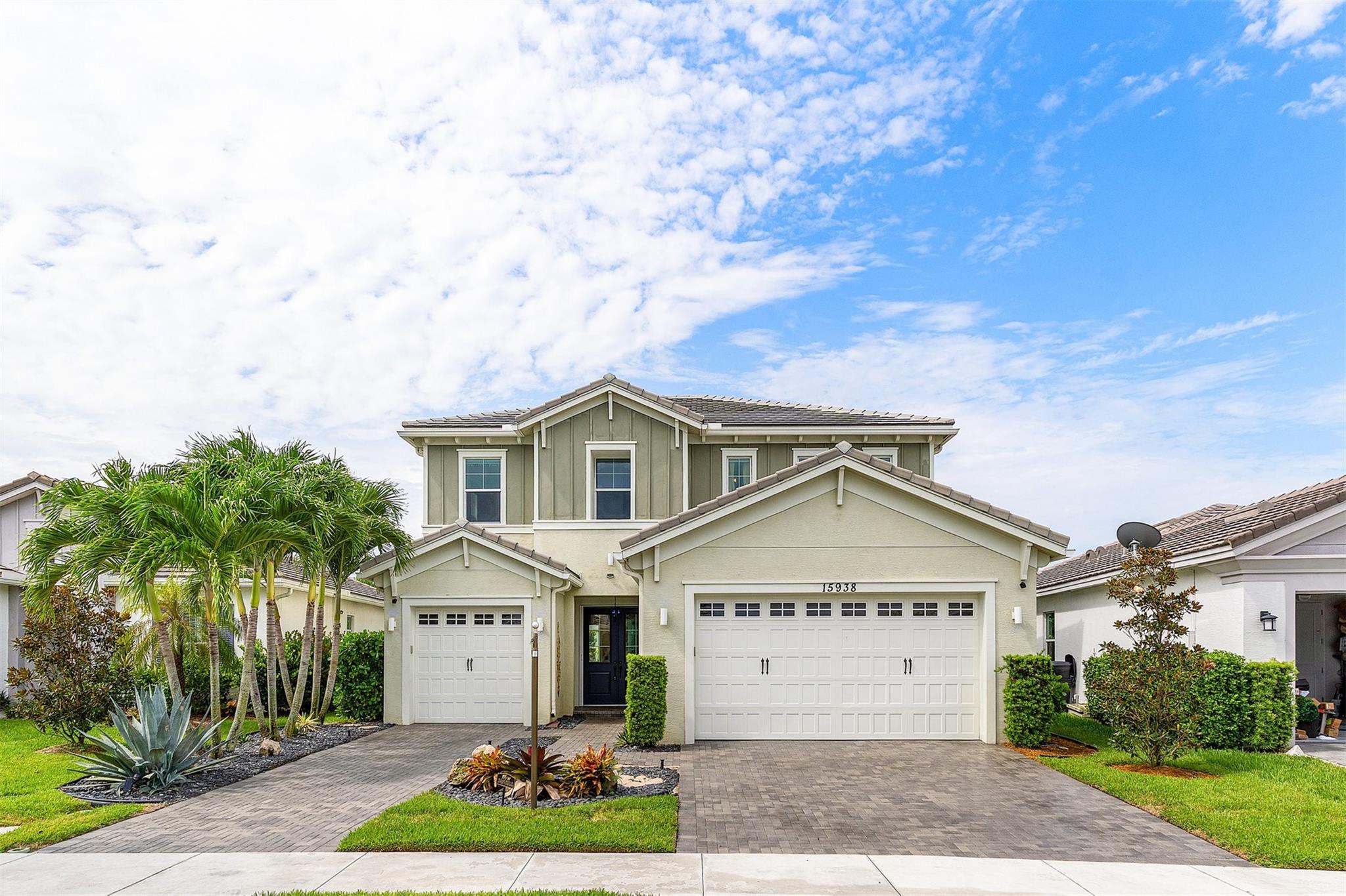 WELCOME HOME! Step inside this absolutely STUNNING & Unique Azalea model in the most desirable Community in ALL of Westlake, The Hammocks! Loaded with tons of upgrades, this Beautiful home features 3 Bedrooms, 2.5 Bathrooms, 3 Car Garage, with a Gorgeous Lakeview & Heated Salt Water Pool within a Huge yard PERFECTLY suited for you to enjoy this serene Paradise in full Privacy! Enter your open floor plan 1st floor with a Large Kitchen Island, Gas Stove, Double Oven, Huge Pantry with Custom Shelving & space BIG enough to entertain. Walk your way up to the massive 2nd story with a Loft & a Primary Suite fit for Royalty! Step into the en-suite Bathroom with a Large separate Shower & Roman Tub where you can unwind & watch TV if you please. Walk-in closets with Custom Cabinets & SO MUCH MORE!