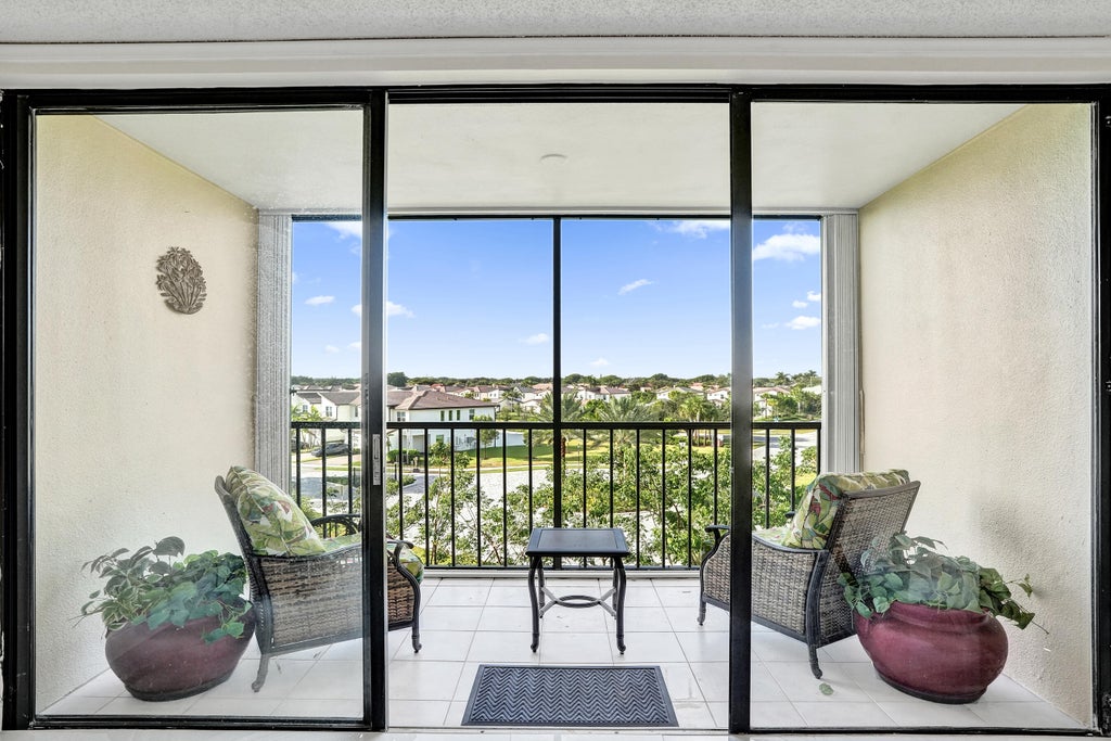 Photo of 5951 WELLESLEY PARK Drive #405, Boca Raton, FL 33433 (MLS # B26069562)