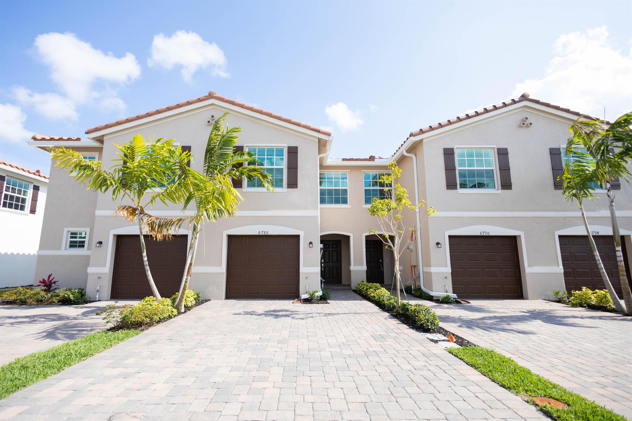 Welcome to this stunning two-story townhome, located just one mile from the Florida Turnpike in the heart of Lake Worth. This newly built home features 3 bedrooms, 2.5 bathrooms, and a bright, open-concept design perfect for families or professionals.The main level boasts a contemporary kitchen with stainless-steel appliances, plenty of counter space, and a seamless flow into the dining and living areas--ideal for entertaining. Upstairs, you'll find three spacious bedrooms filled with natural light and ample closet space.This beautiful townhome is the perfect place to call home!