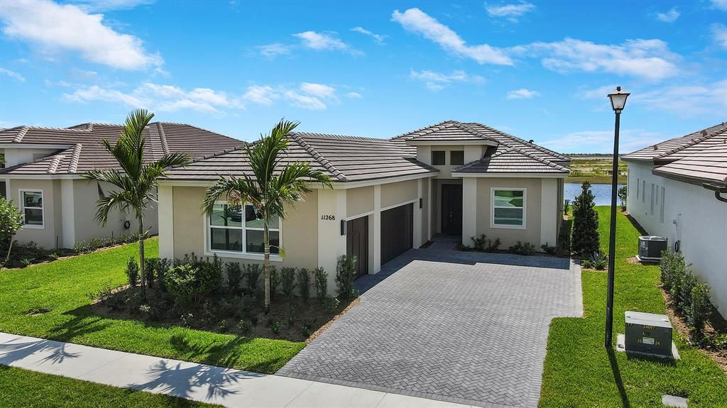 Photo of 11268 SW Lunata Way, Port Saint Lucie, FL 34987 (MLS # R10751491)