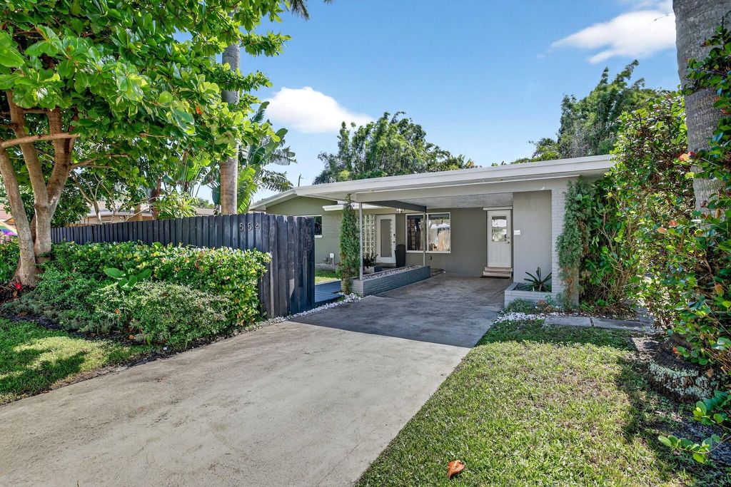 Photo of 554 NW 45th Court, Oakland Park, FL 33309 (MLS # R11133119)