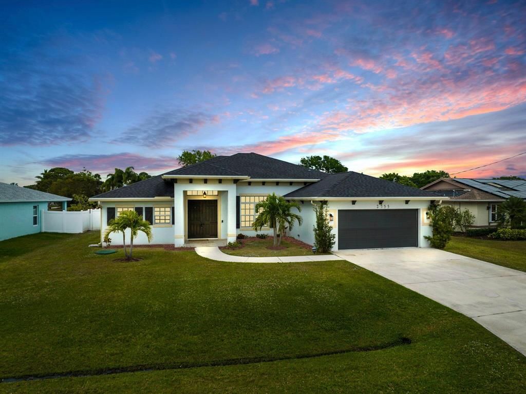 Photo of 2755 SE Rawlings Road, Port St Lucie, FL 34952 (MLS # R10880950)