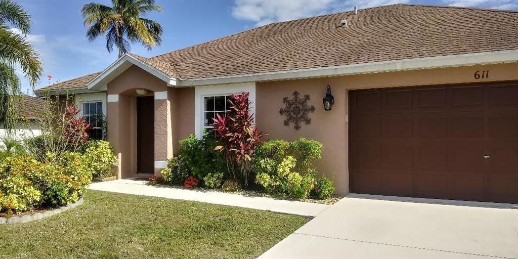 Photo of 611 SW Addie Street, Port Saint Lucie, FL 34983 (MLS # R10761275)