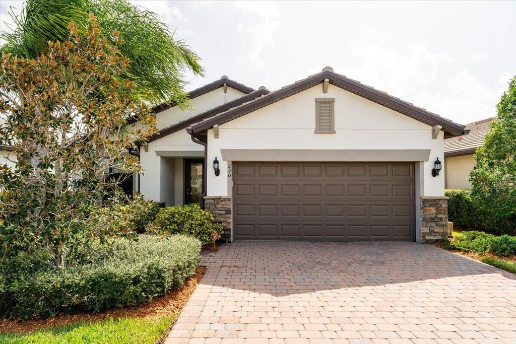 Photo of 230 SE Longview Drive, Port Saint Lucie, FL 34984 (MLS # R10924290)