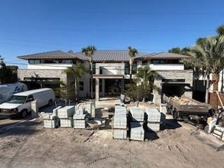 Brand New ZEN Masterpiece On Oversized Waterfront Lot. 6 EnSuite Bedrooms, 2 VIP Br's, Master Rivaled By None. Designed & Built w/The Finest Finishes, German Nolte Kitchen Cabinets, Belgard Paver Driveway w/ Electric Security Gates. Step Under The 15' Long Glamorous Front Covered Entryway & Into The Sprawling Kitchen/Living Area w/ 24' Soaring Ceilings & Floor To Ceiling Glass, There Is No Other That Competes! Concrete 2nd Fl w/ Recessed No Curb Shower Floors, Rare Natural Gas. A/C’s Are Heat Pumps So Efficient Heating. New 100' Concrete Dock, w/100 Amp Yacht Service, Perfect Gazebo Summer Kitchen, 3-Car Garage Stalls, One Is Lift Compatible, Generac Generator. A Spectacular Residence For Only One Deserving Buyer. Insulated Residential Windows So No Condensation Ever! Completion April 2026