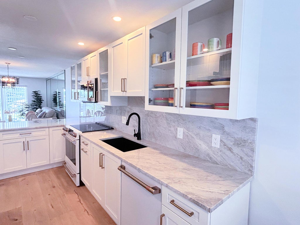 Photo of 1030 SILK OAK Terrace #203, Delray Beach, FL 33445 (MLS # B26070883)