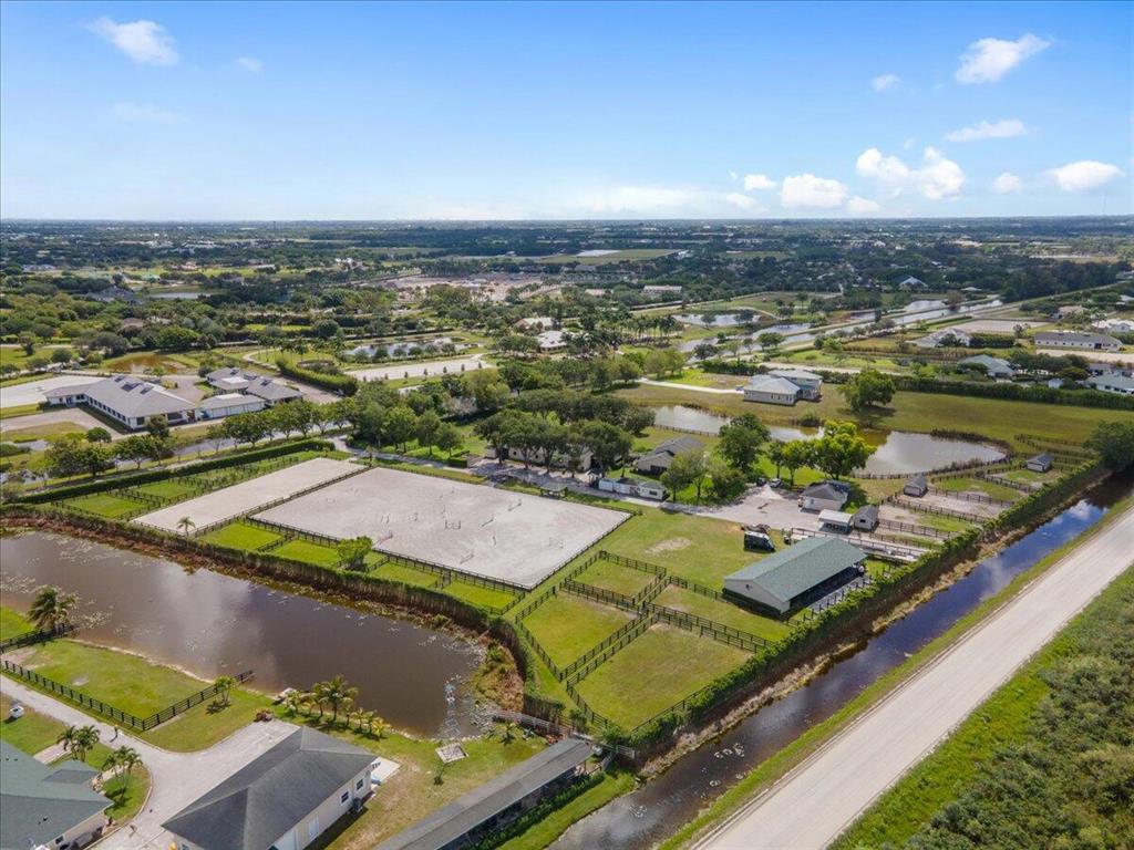 This equestrian facility in the back of the gated Palm Beach Point community is available to rent! Property has total of 36 stalls, one 24-stall barn and one 12-stall barn. Property also has a 3 bedroom guest house, a riding arena complete with jumps, and lunging ring, plenty of paddocks and 4 RV hookups. The listing price of $1,500 is per stall, per month. The guest house is available for $4,000 per month and the RV hookups are $1,000 each. Minimum lease term is 4 months.