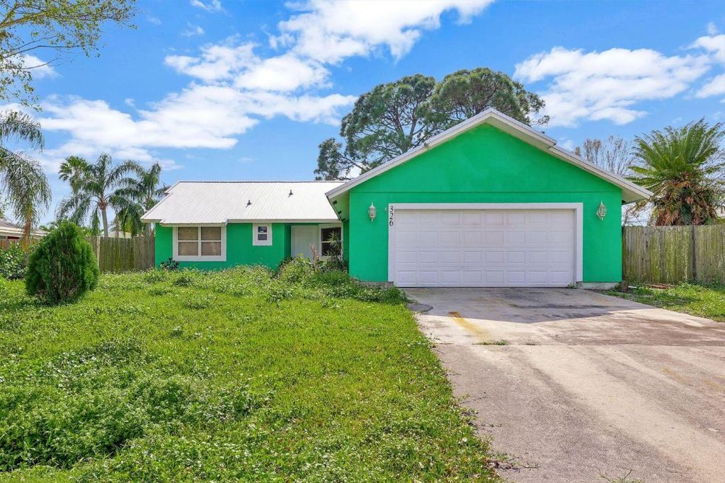 Photo of 326 NE Greenbrier Avenue, Port Saint Lucie, FL 34983 (MLS # R10958978)