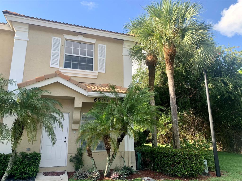 Upgraded end unit in highly desirable community - Smithbrooke. This two bedroom, two and a half bath townhouse is nestled perfectly in the back of the neighborhood. Very private and quiet corner unit, with no rear neighbors. Lush greenery in the back of property and on the side. Complete with two master suites. Upgraded kitchen features stainless steel appliances and quartz countertops. No carpet. Laminate and tile flooring throughout. Covered patio includes storage closet. Close to shops, restaurants, and A-rated schools. Amenities include: clubhouse, resort-style pool, fully equipped fitness center, and racquet ball court. Basic cable included.