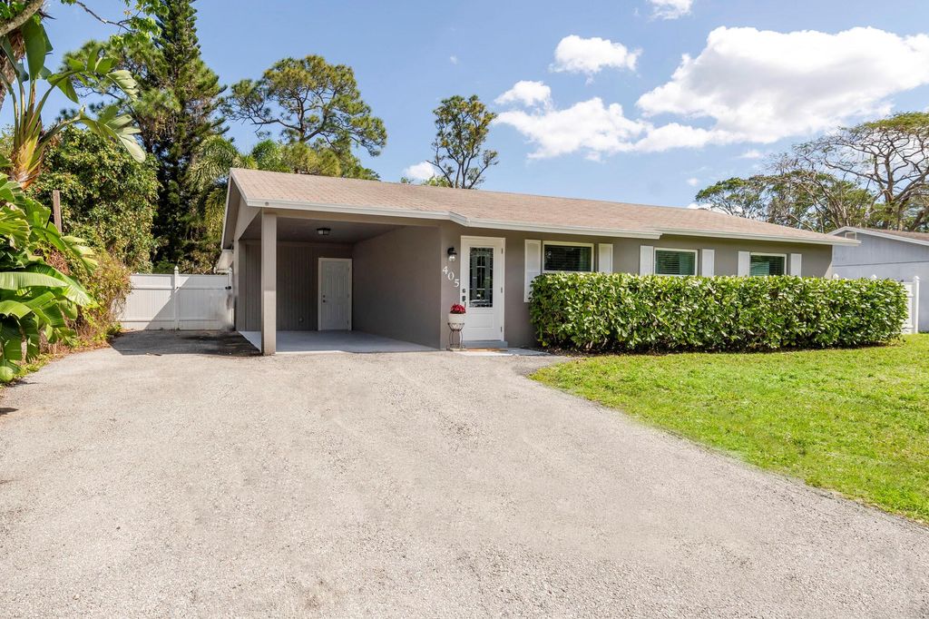 Photo of 405 S Delaware Boulevard, Jupiter, FL 33458 (MLS # R10963840)