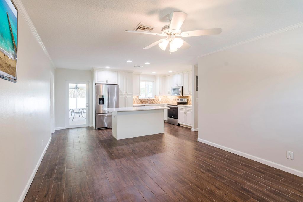 Photo of 405 S Delaware Boulevard, Jupiter, FL 33458 (MLS # R10963840)