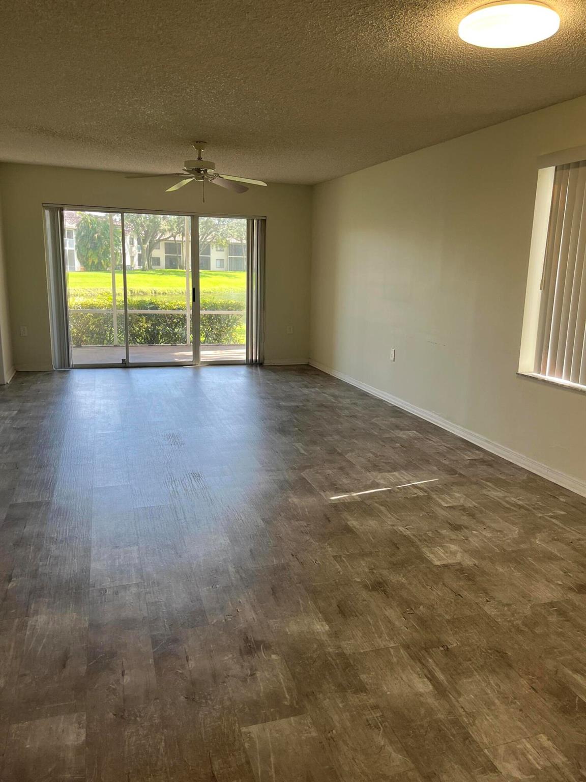 Updated 2/2 First Floor corner unit. Newer Laminate Flooring, no carpeting...Newer A/C Unit, Newer Appliances, Fixtures, Gated Community offers Pool, Clubhouse, nearby Publix, Duffy's, Panera, CR Chicks, close to major roads, highways, downtown