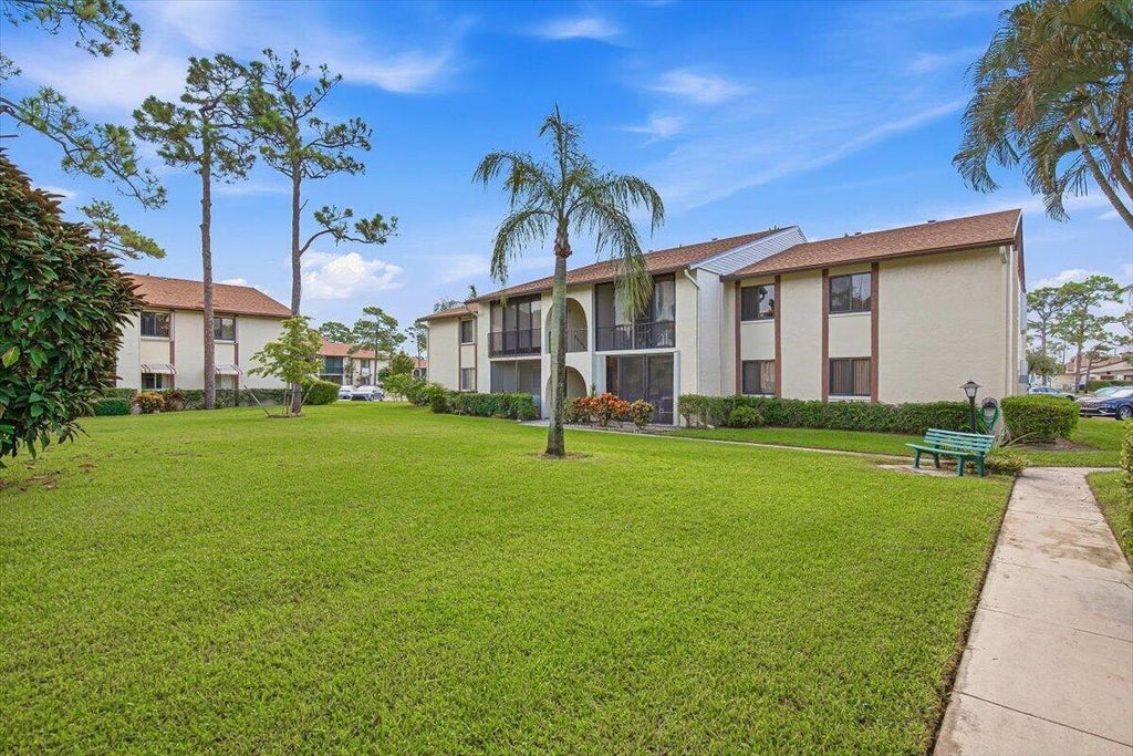 Photo of 331 KNOTTY PINE Circle #D-2, Greenacres, FL 33463 (MLS # B26073936)