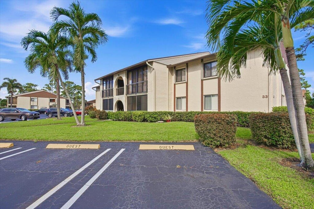 Photo of 331 KNOTTY PINE Circle #D-2, Greenacres, FL 33463 (MLS # B26073936)