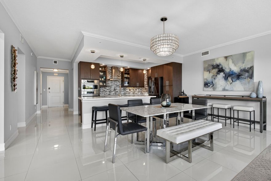 SPECTACULAR PENTHOUSE Condo. 3BR, 2.5BA. With unobstructed views of Resort Community of Bay Colony in Juno Beach.  Open Floor Plan. SS Appliances. Quartz counters. Large Island Kitchen. Private Balcony open to LR & Den, overlooks resort pool, fire pit, & landscaped gardens.3rd BR is currently den/office. Crown Molding. Custom Oversized Closets.New AC.New Washer & Dryer. Bay Colony amenities include pool, spa, gym, fire pit, tennis, pickleball, clubhouse & a private marina. Boat slips may be purchased separately.