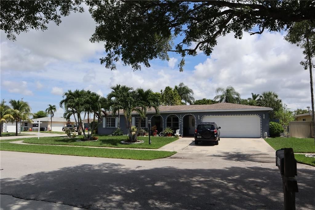 Photo of 10941 Galahad St St, Boca Raton, FL 33428 (MLS # F10327421)