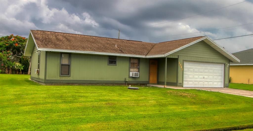 Photo of 2581 SE Robin Circle Cir SE, Port St Lucie, FL 34952 (MLS # R10807345)