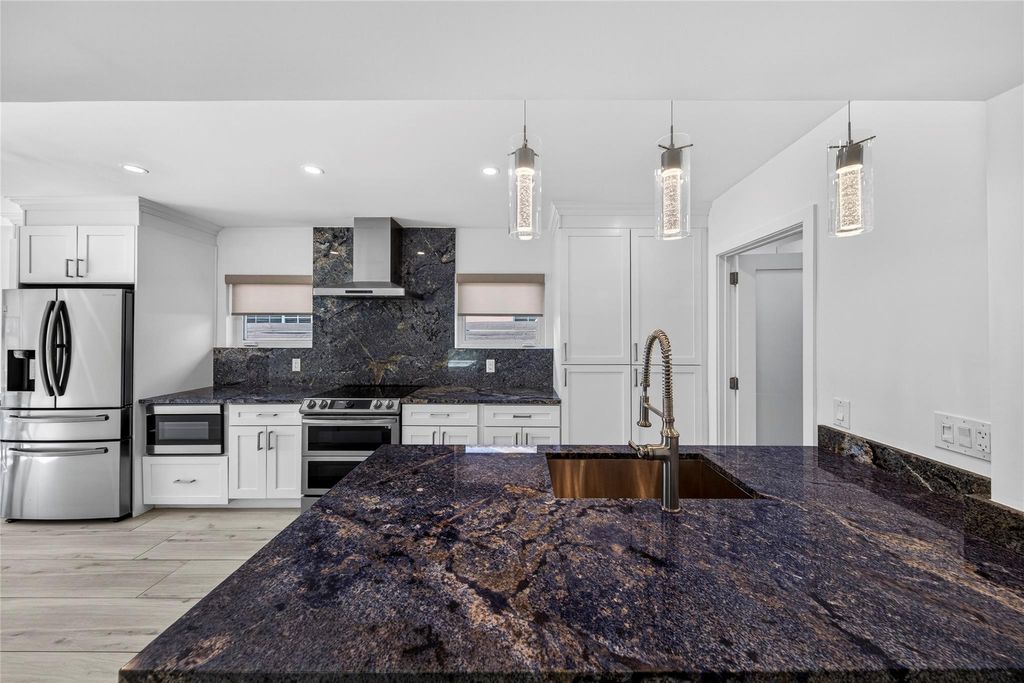 Photo of 1763 NE 15th St, Fort Lauderdale, FL 33304 (MLS # F10540237)