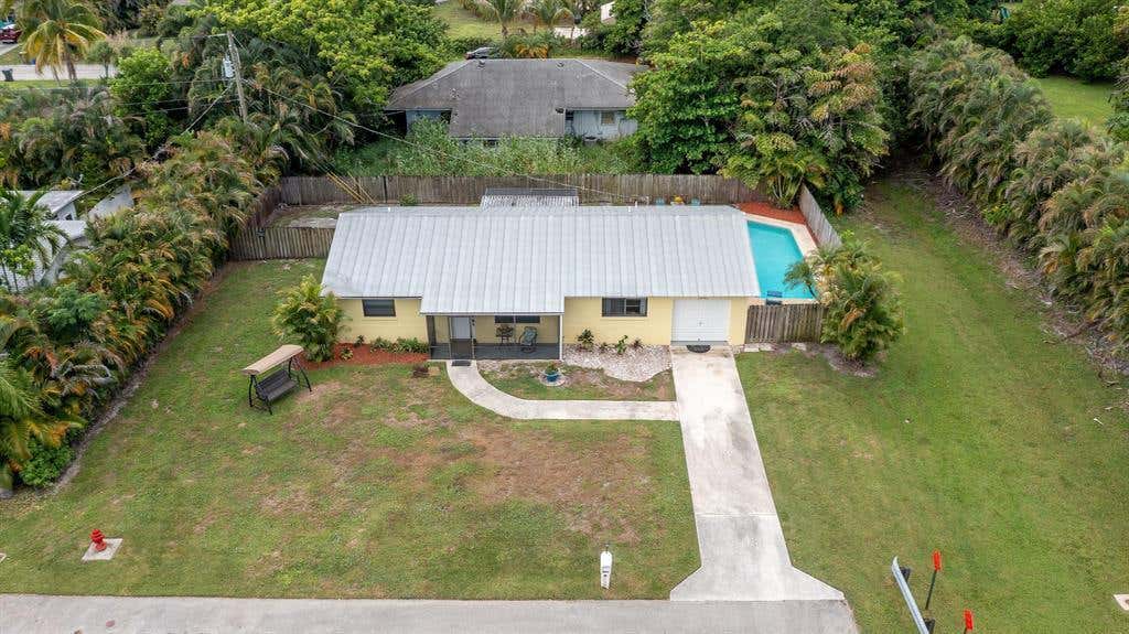 Photo of 9240 HONEYWELL Road, Lake Worth, FL 33467 (MLS # B26058009)