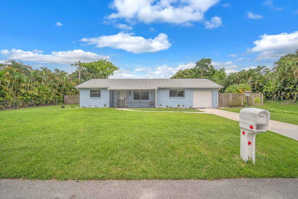 Photo of 9240 HONEYWELL Road, Lake Worth, FL 33467 (MLS # B26058009)