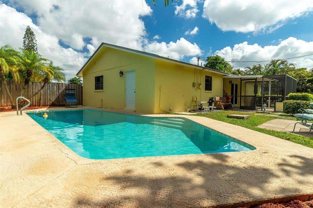 Photo of 9240 HONEYWELL Road, Lake Worth, FL 33467 (MLS # B26058009)