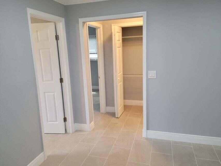 Photo of 4010 N SHORE Drive, West Palm Beach, FL 33407 (MLS # B26070250)