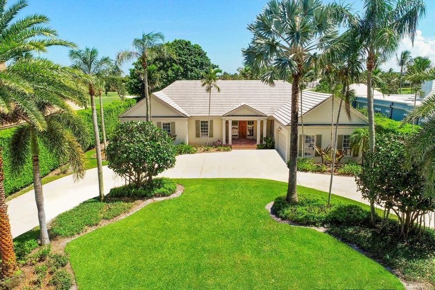 Located one block from the ocean on a quiet cul-de-sac street with expansive views of the 6th & 7th fairways to the south you take full advantage of the prevailing ocean breezes from your private pool setting, patio and loggia.  At over 5,200 square feet, this residence features 3 bedrooms and 4 1/2 baths plus a study situated on over one-half acre of property. Great opportunity to modify or build your own dream home!