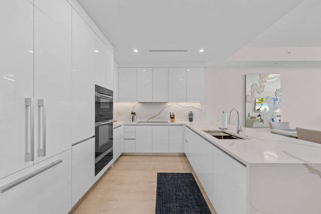 Photo of 220 Lake Shore Drive #1410, Lake Park, FL 33403 (MLS # R11167956)