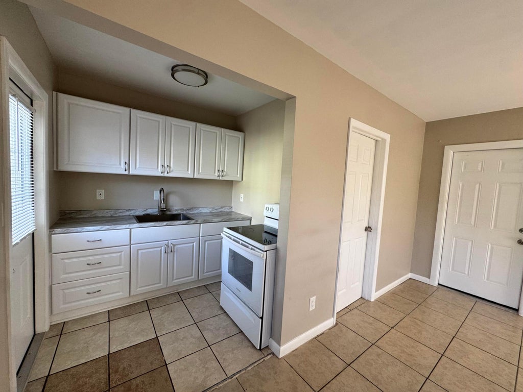 Photo of 602 TEXAS Court #A, Fort Pierce, FL 34950 (MLS # B26076537)