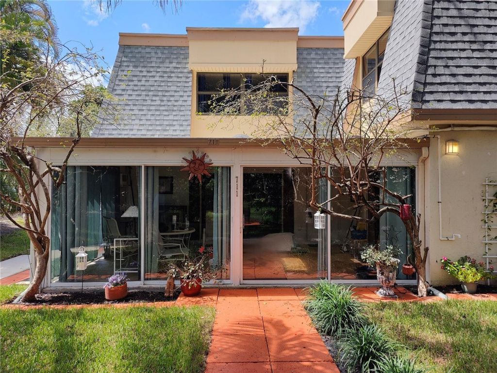 Photo of 711 NW 25th Avenue #D, Delray Beach, FL 33445 (MLS # F10461925)