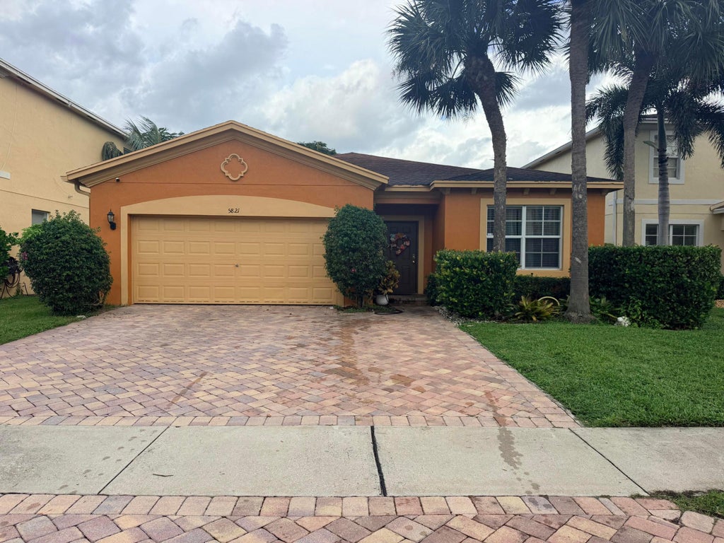 Photo of 5821 Gypsum Place, West Palm Beach, FL 33413 (MLS # B26092614)