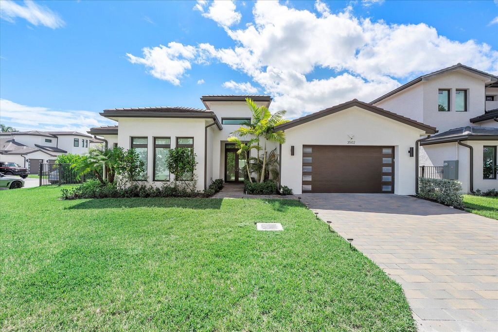 Photo of 3502 Ashwood Circle N, Fort Lauderdale, FL 33312 (MLS # B26022540)