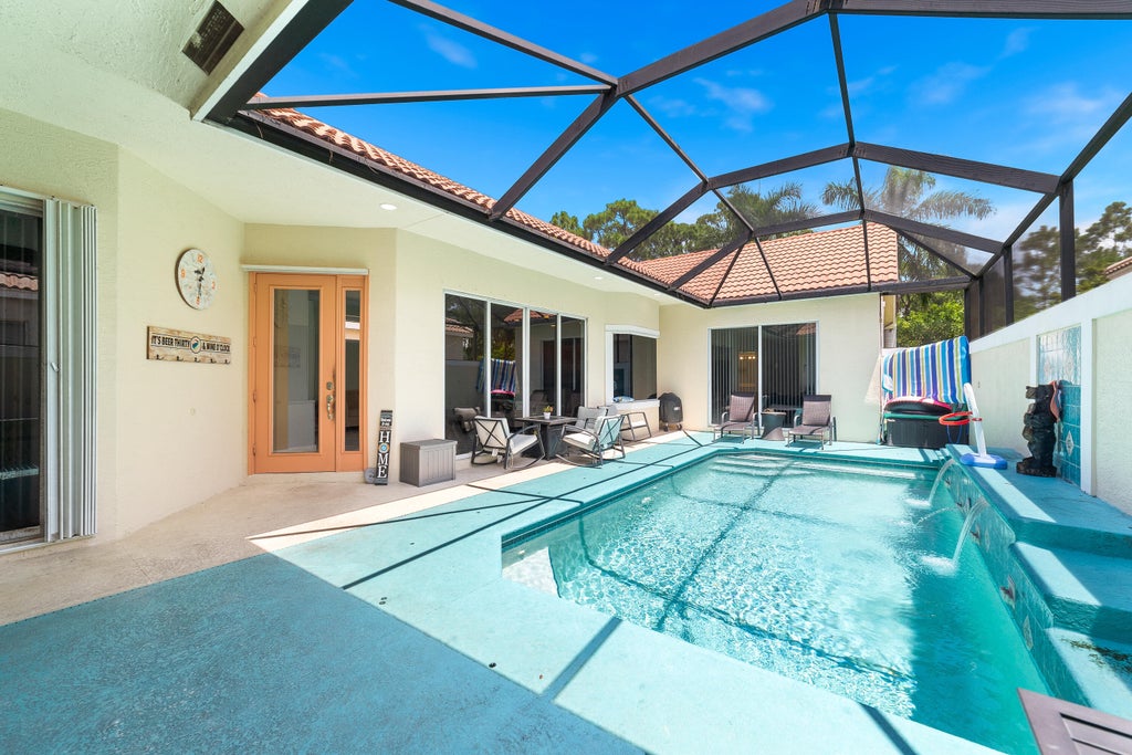 Photo of 775 SW Munjack Circle, Port Saint Lucie, FL 34986 (MLS # B26071905)