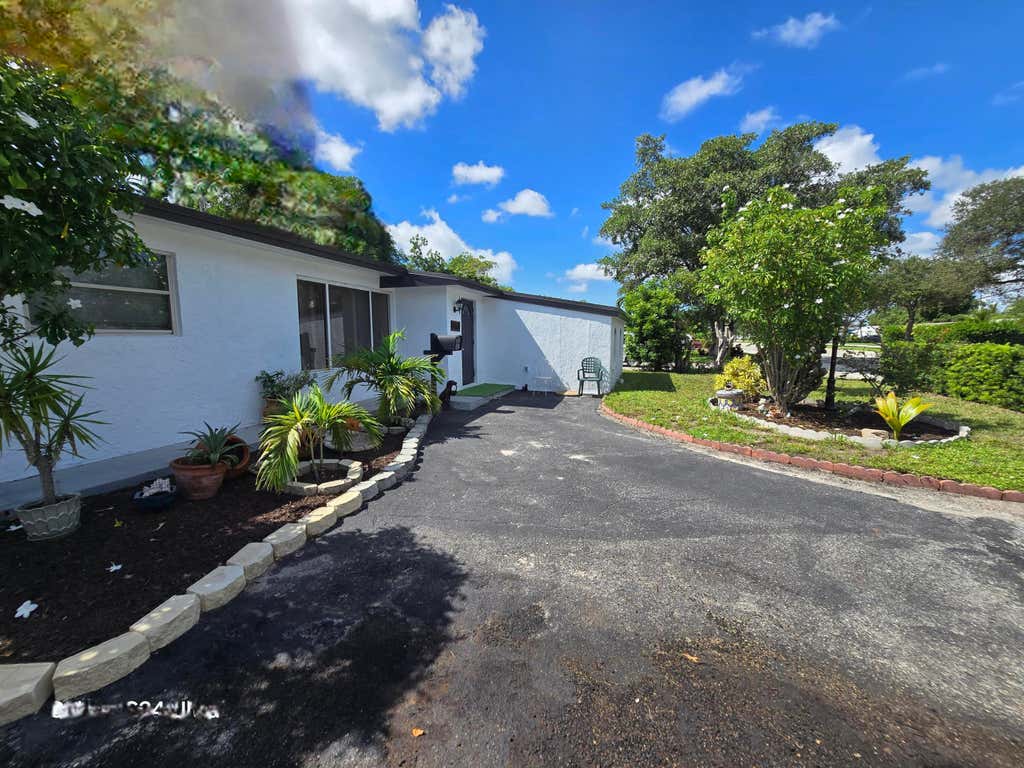 Photo of 6138 SOUTHGATE Boulevard, Margate, FL 33068 (MLS # B26065318)