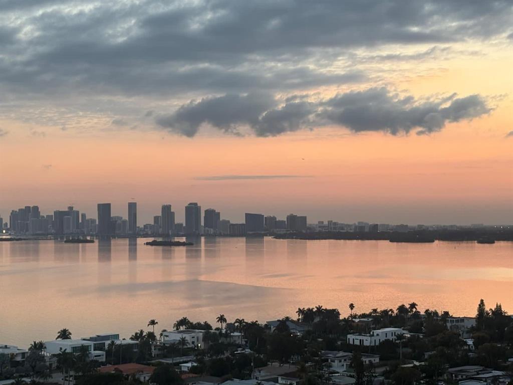 ABSOLUTELY STUNNING 2/2 PLUS A DEN/OFFICE THAT CAN BE A 3RD BEDROOM CONDO ON THE TOP FLOOR TOTALLY REMODELED AND AMAZING VIEWS OF BISCAYNE BAY, MIAMI BEACH, DOWNTOWN MIAMI AND THE PORT OF MIAMI. PORCELEIN FLOORS THROUGHOUT WITH GRANITE COUNTER TOPS, WOOD CABINETS, AND STAINLESS STEEL APPLIANCES. FULL WASHER/DRYER IN UNIT. LARGE OPEN BALCONY WONDERFUL TO RELAX ON AND ENJOY ALL THAT MIAMI BEACH HAS TO OFFER. 2 COVERED PARKING SPOTS, LARGE GYM, BEAUTIFUL POOL AND NEW DECK WITH INCREDIBLE VIEWS. JUST MINUTES FROM SOUTH BEACH, WYNWOOD, OR BRICKELL...ALL WITH GREAT RESTAURANTS, ENTERTAINMENT, OR JUST TO HEAD TO OCEAN. PETS ALLOWED. THIS IS A MUST SEE!!!!!