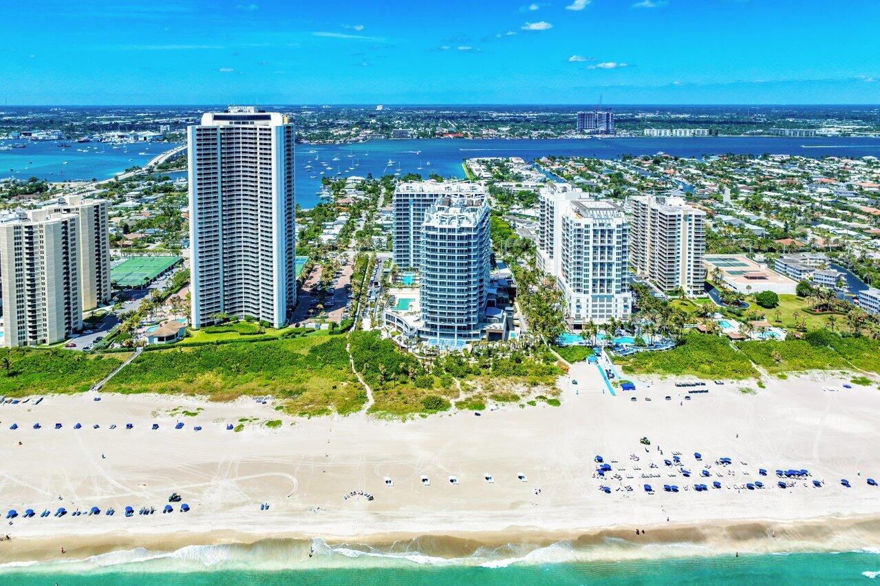Paradise on the Beach! Rent in this stunning designer furnished 2-bedroom, 2-bath oceanfront condo on Singer Island, FL. With a versatile den perfect for a home office or additional guest space, this bright and airy unit boasts panoramic ocean views from every room. Enjoy your morning coffee on the expansive balcony as you watch the sunrise over the Atlantic. The modern kitchen features sleek appliances and ample counter space. The primary suite offers a tranquil retreat with a private bath and generous closet space. Residents enjoy exclusive access to a resort-style pool, fitness center, and direct beach access. Live the coastal dream every day! Being offered at Annual/Semi-Annual, Monthly or Weekly rates.