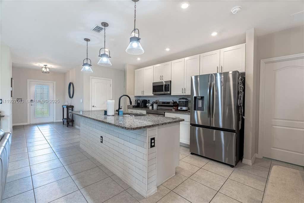 Photo of 10609 SW Vasari Way, Port Saint Lucie, FL 34987 (MLS # A11927063)