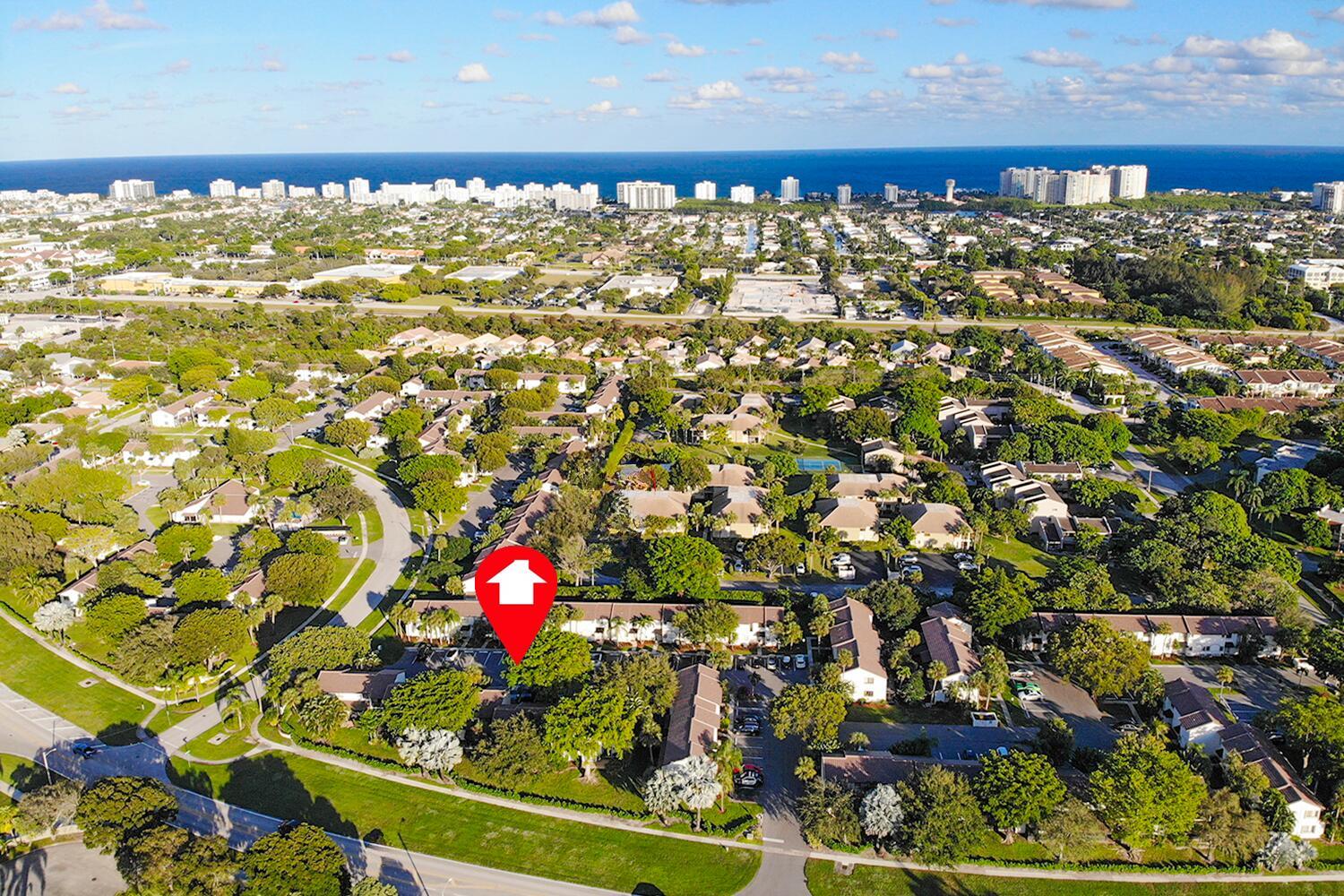 FURNISHED 2 bedroom, 2 full bath townhome in East Boca Raton, just minutes from Mizner Park, FAU, the beach, and the Town Center Mall. The open-concept layout brings in natural light and flows to a screened patio and outdoor space perfect for grilling. Full bath downstairs and in-unit laundry with full-size washer and dryer.Both bedrooms are located upstairs, including a primary suite with BALCONY access and a spacious walk-in closet. Stylish flooring is featured throughout, with no carpet. Enjoy resort-style amenities, including two pools, a clubhouse with a kitchen, billiards, a sauna, a business center, and more. This is a well-maintained community in an unbeatable location.