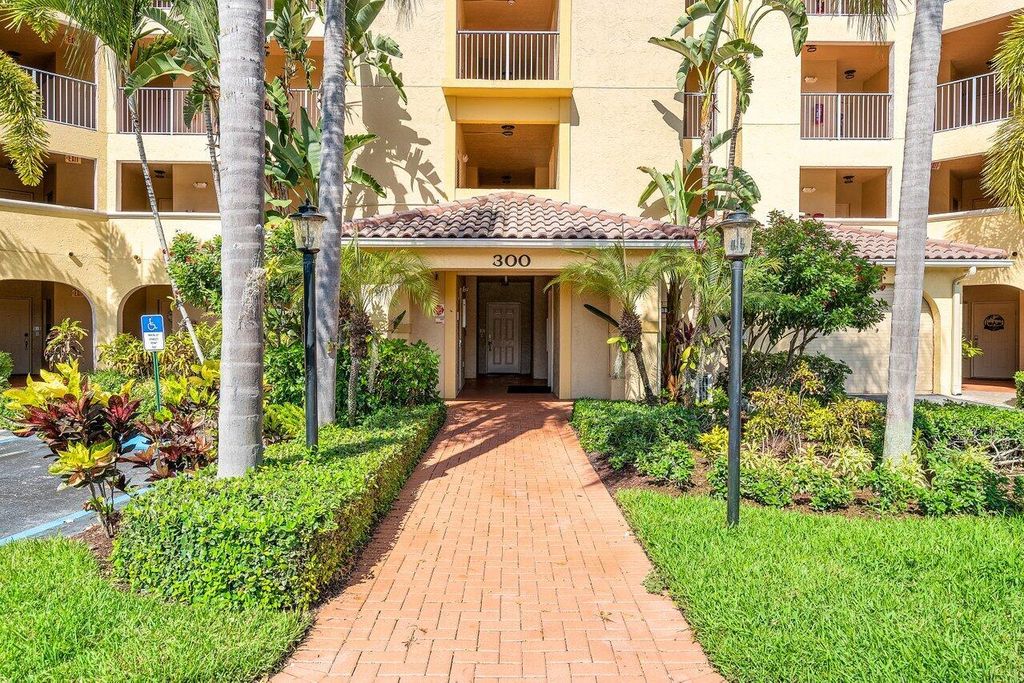 Photo of 300 Uno Lago Drive #304, Juno Beach, FL 33408 (MLS # R11076650)