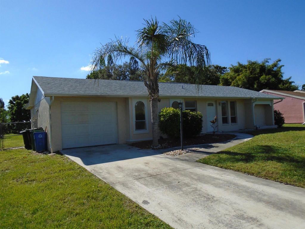Photo of 2007 SE New York Street, Port St Lucie, FL 34952 (MLS # R10890748)