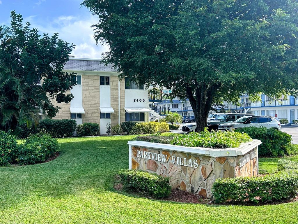 Photo of 2400 Lake Osborne Drive #102, Lake Worth Beach, FL 33461 (MLS # R11149975)