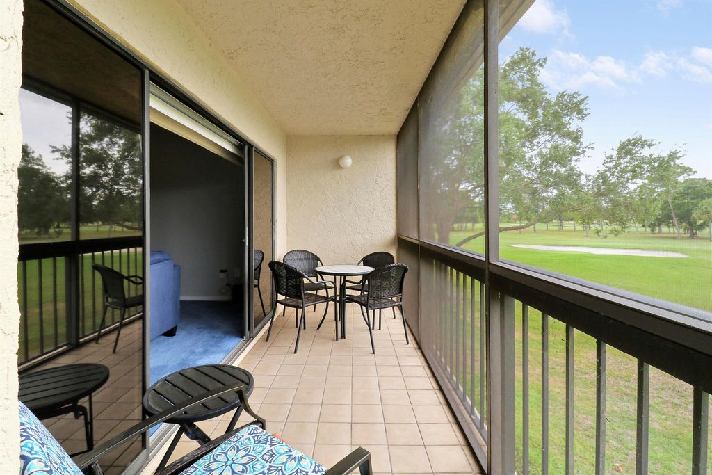 Photo of 9450 Meadowood Drive #203, Fort Pierce, FL 34951 (MLS # R10993005)