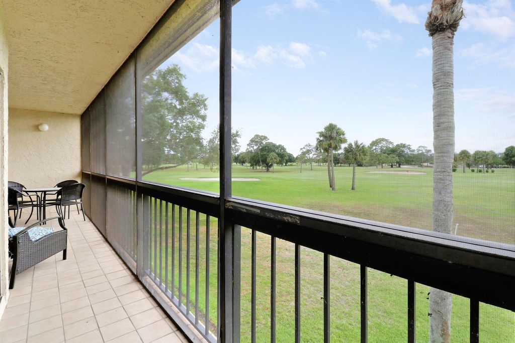 Photo of 9450 Meadowood Drive #203, Fort Pierce, FL 34951 (MLS # R10993005)